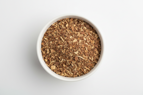 WITCH HAZEL CUT AND SIFTED, IN A WHITE BOWN WHITE BACKROUND FROM AIREAL VIEW